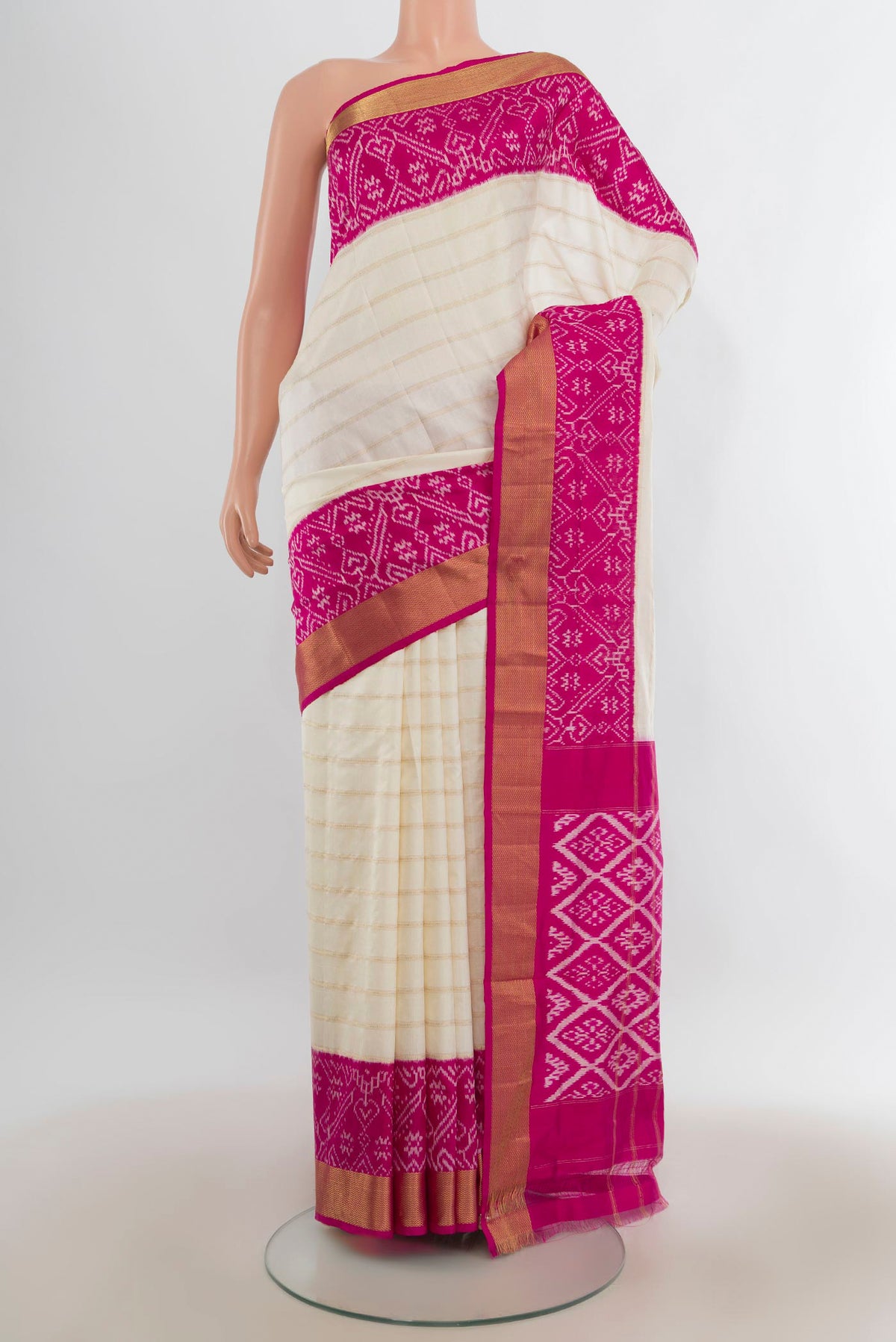 Pure Silk Off White Pochampally Saree with Stripes on the body and Ikat Border.  displayed on a mannequin