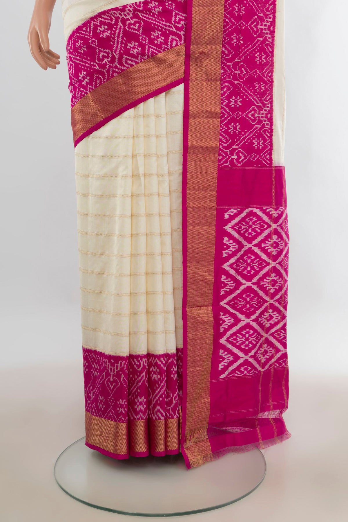 Pleats and pallu of Pure Silk Off White Pochampally Saree with Stripes on the body and Ikat Border. 