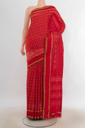 Pure Silk Red Pochampally Saree with Pure Ikat on the body and Zari Border.  displayed on a mannequin