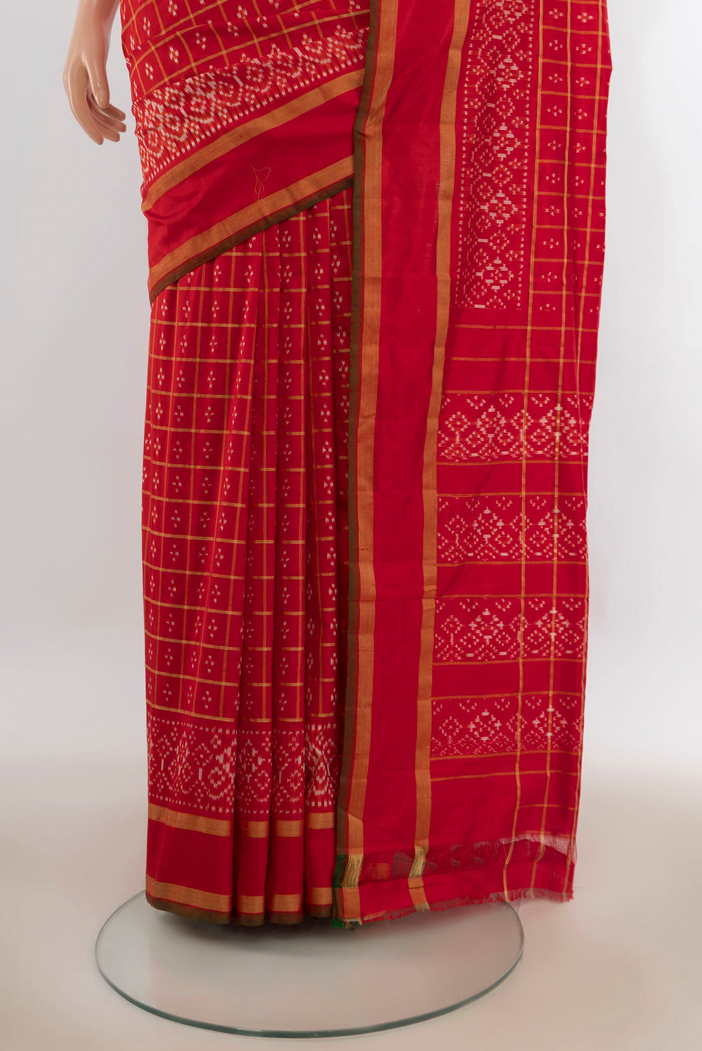 Pleats and pallu of Pure Silk Red Pochampally Saree with Pure Ikat on the body and Zari Border. 