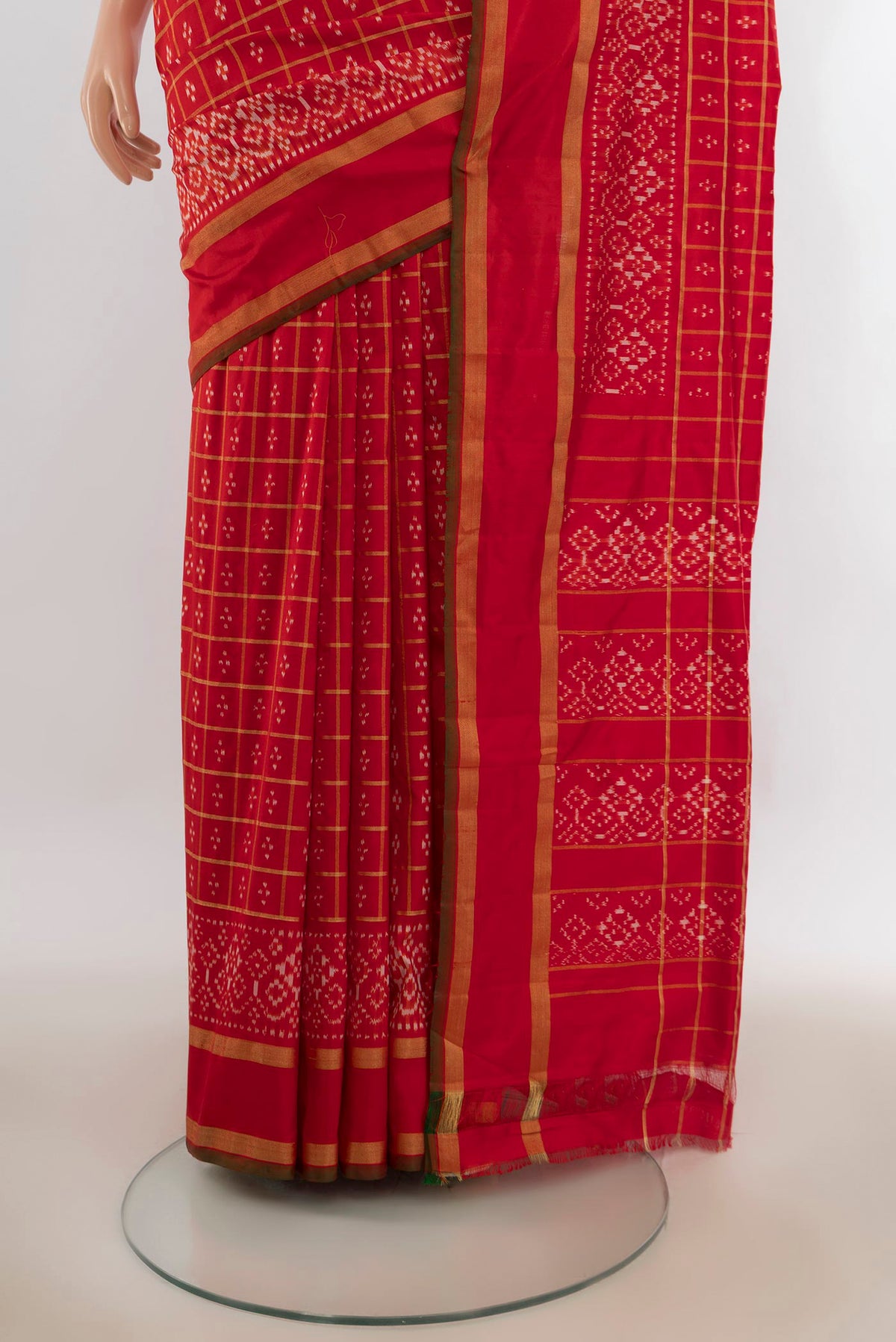 Pleats and pallu of Pure Silk Red Pochampally Saree with Pure Ikat on the body and Zari Border. 