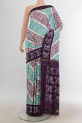 Pure Silk Multi Color Pochampally Saree with Pure Ikat on the body and Plain Border.  displayed on a mannequin