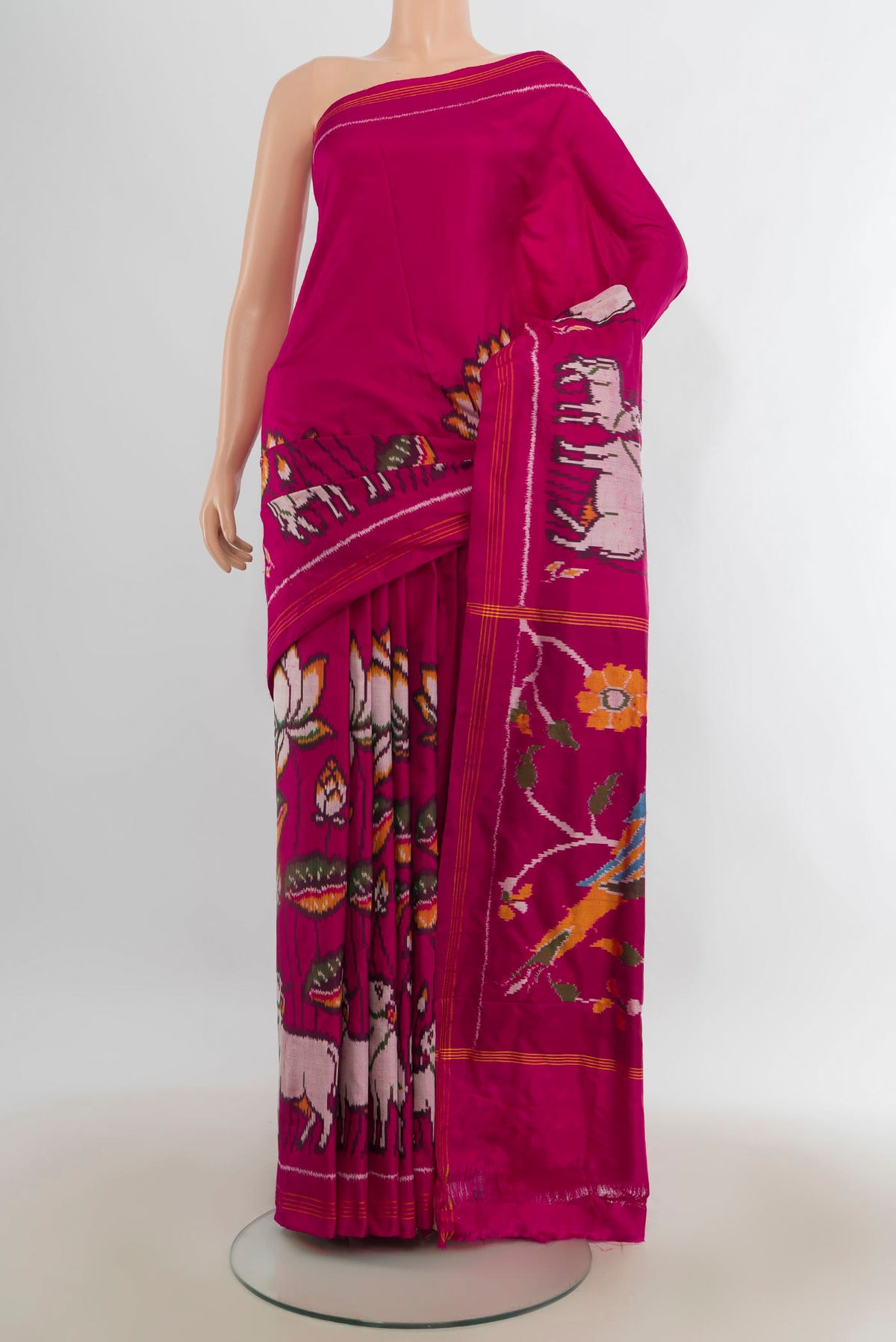 Pure Silk Dark Pink Pochampally Saree with Plain Body and Plain Border.  displayed on a mannequin