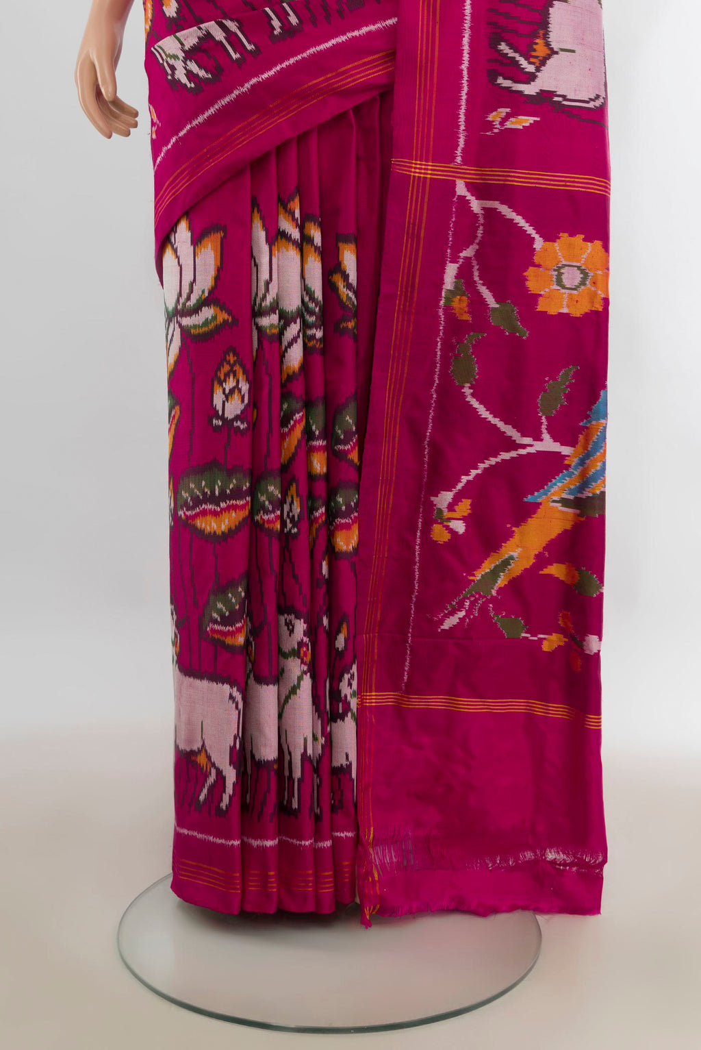Pleats and pallu of Pure Silk Dark Pink Pochampally Saree with Plain Body and Plain Border. 