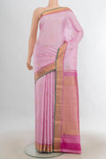 Pure Silk Rose Gold Kanchipuram Saree with Zari Butta on the body and Silk Border.  displayed on a mannequin