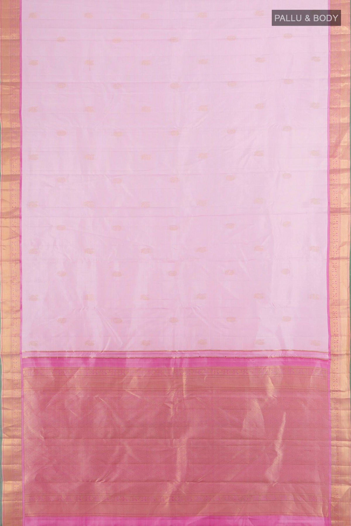 Flat view of Pure Silk Rose Gold Kanchipuram Saree with Zari Butta on the body and Silk Border. 