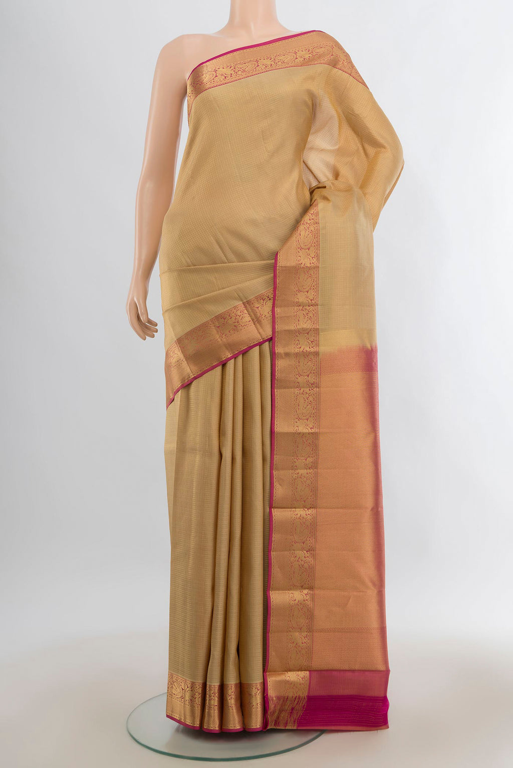Pure Silk Sandal Kanchipuram Saree with Zari Butta on the body and Zari Border.  displayed on a mannequin