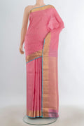 Pure Silk Rose pink Kanchipuram Saree with Zari Butta on the body and Silk Border.  displayed on a mannequin