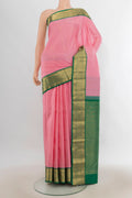 Pure Silk Rose pink Kanjivaram Saree with Zari Butta on the body and Zari Border.  displayed on a mannequin