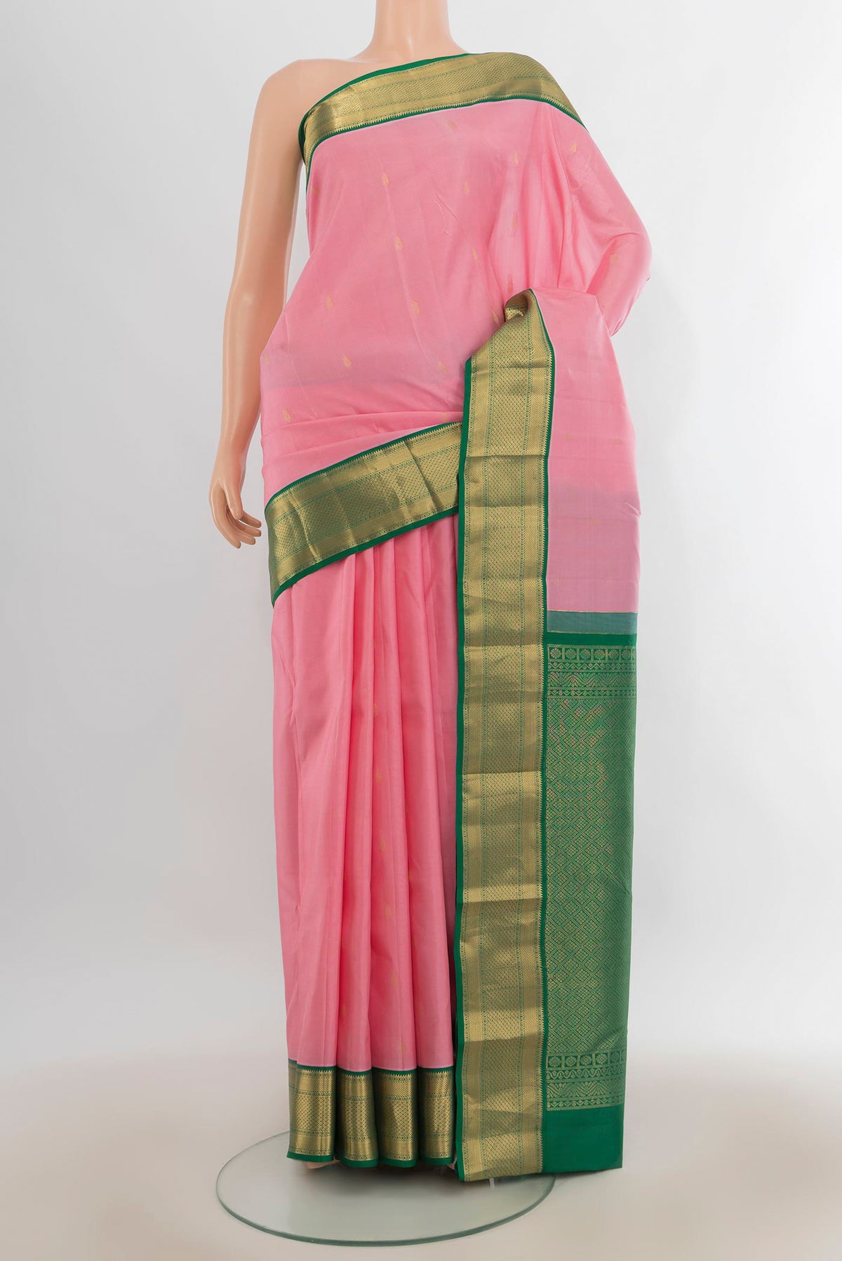 Pure Silk Rose pink Kanjivaram Saree with Zari Butta on the body and Zari Border.  displayed on a mannequin
