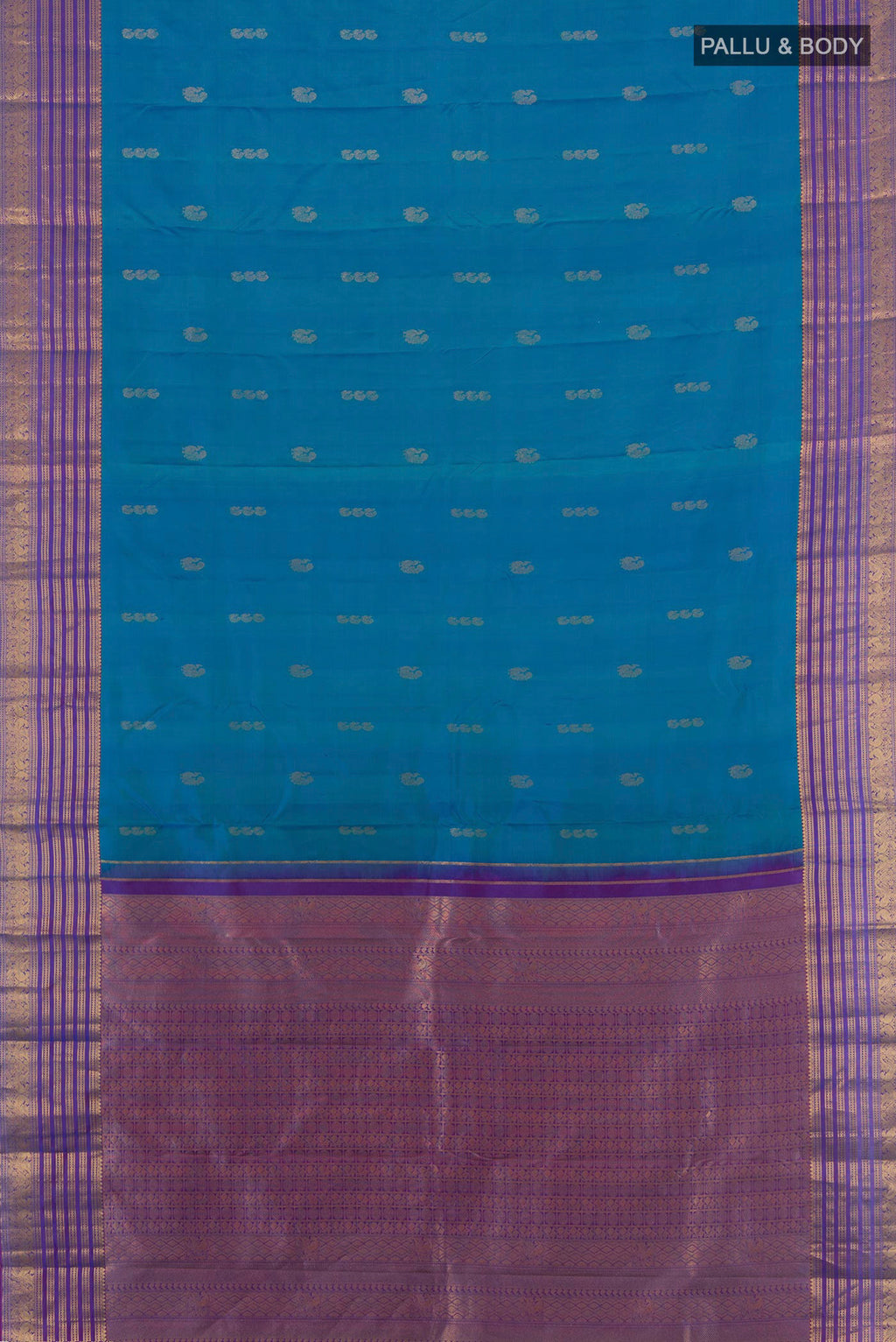 Flat view of Pure Silk Peacock Blue Kanchipuram Saree with Zari Butta on the body and Zari Border. 