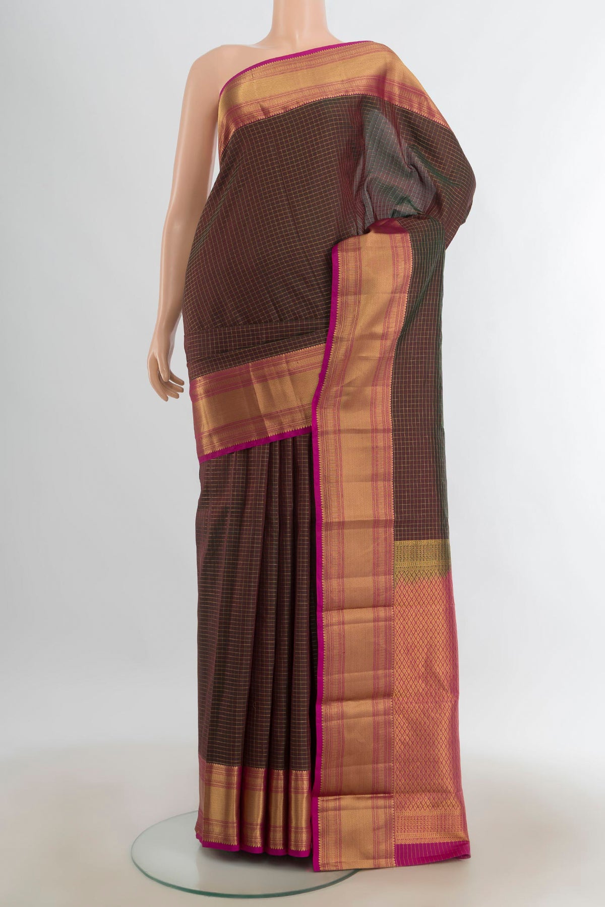 Pure Silk Coffee Brown Kanjivaram Saree with Zari Butta on the body and Silk Border.  displayed on a mannequin