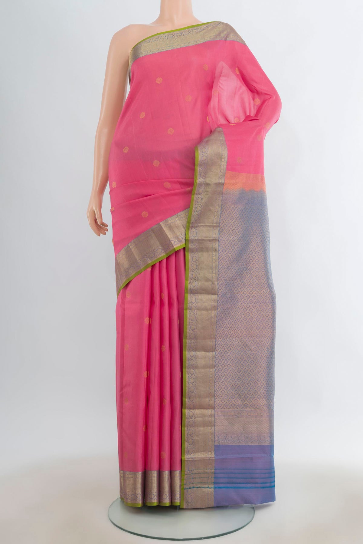 Pure Silk Rose pink Kanjivaram Saree with Zari Butta on the body and Zari Border.  displayed on a mannequin