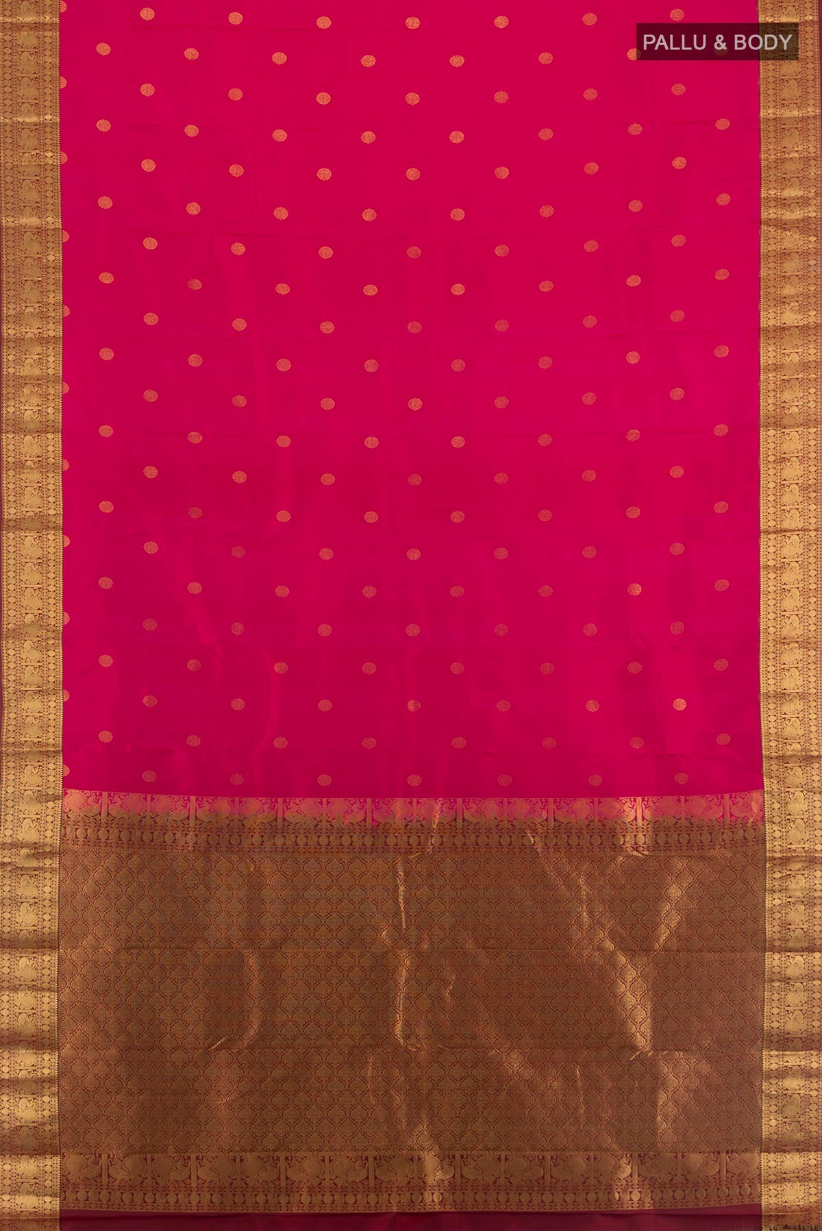 Flat view of Pure Silk Dark Pink Kanchipuram Saree with Zari Butta on the body and Zari Border. 