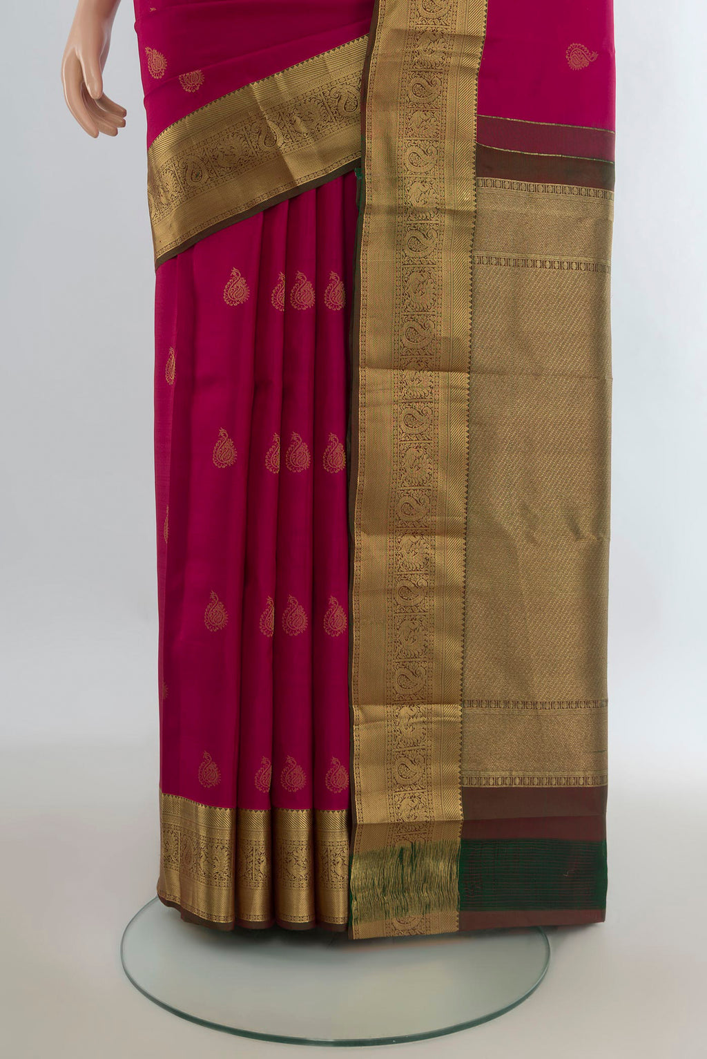 Pleats and pallu of Pure Silk Dark Pink Kanjivaram Saree with Zari Butta on the body and Zari Border. 