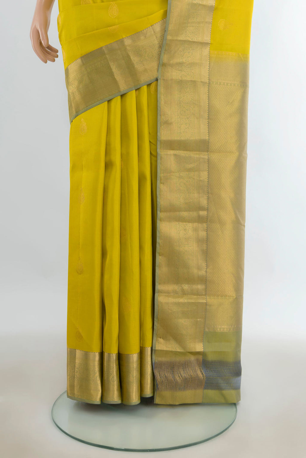 Pleats and pallu of Pure Silk Light Green Kanjivaram Saree with Zari Butta on the body and Silk Border. 