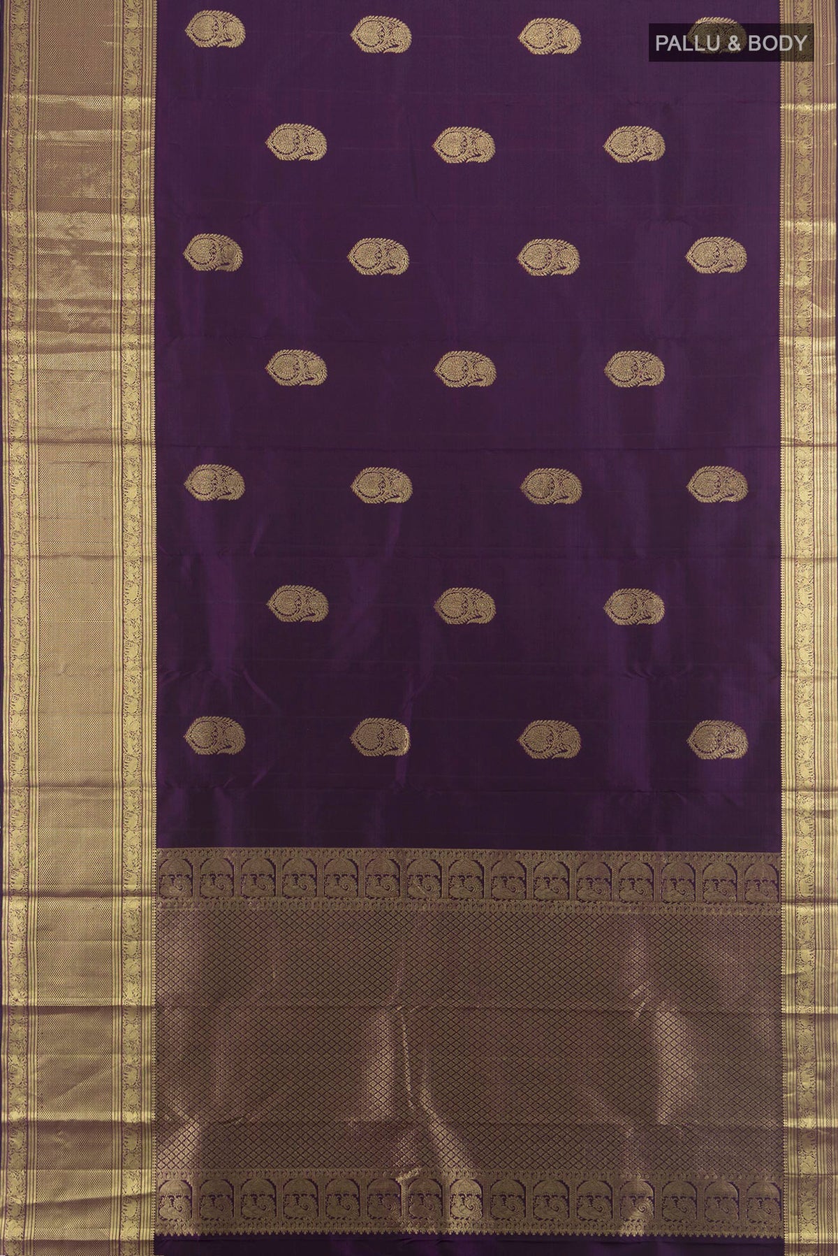 Flat view of Pure Silk Purple Kanjivaram Saree with Zari Butta on the body and Zari Border. 