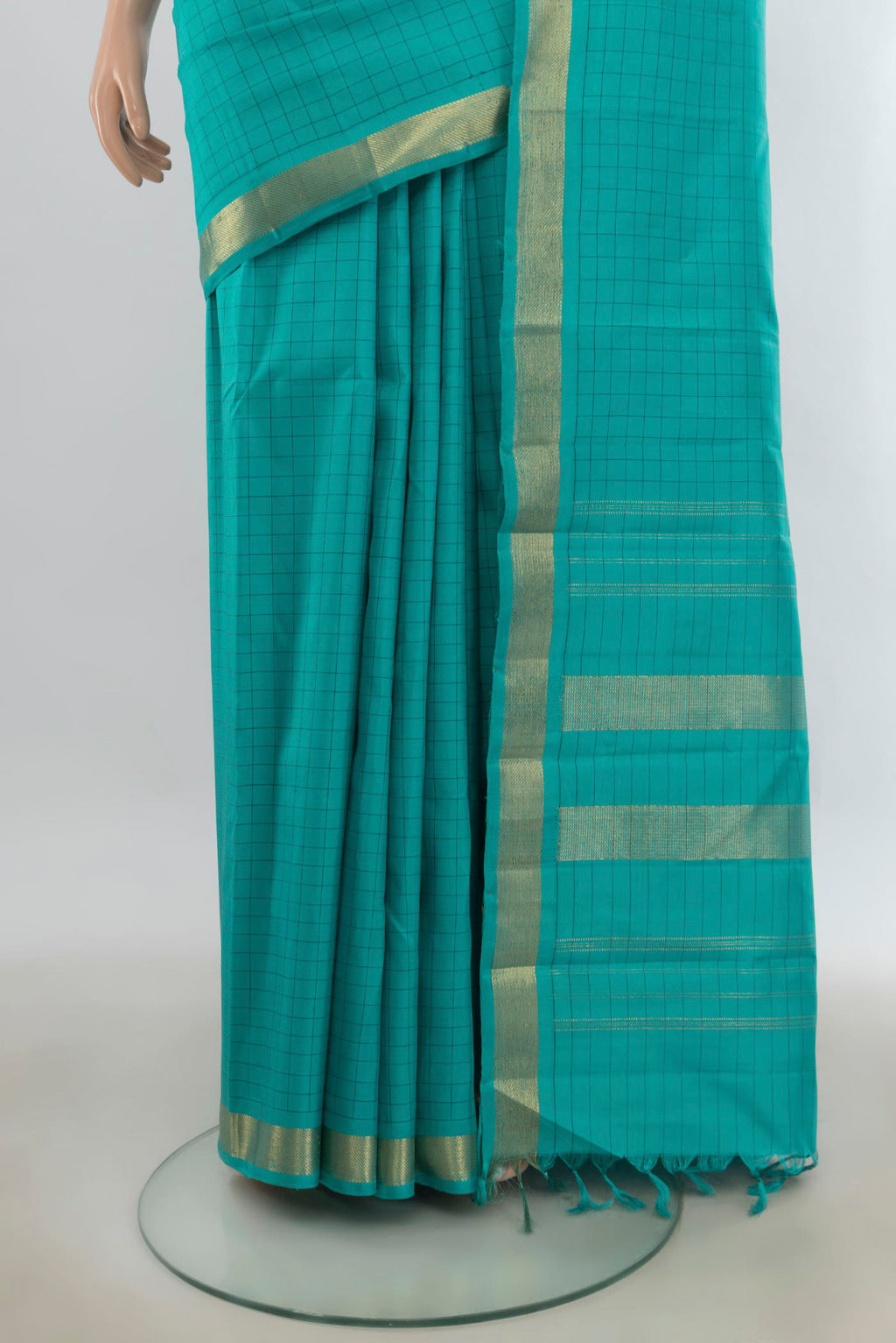 Pleats and pallu of Pure Silk Turquoise Kanjivaram Saree with Checked design on the body and Zari Border. 