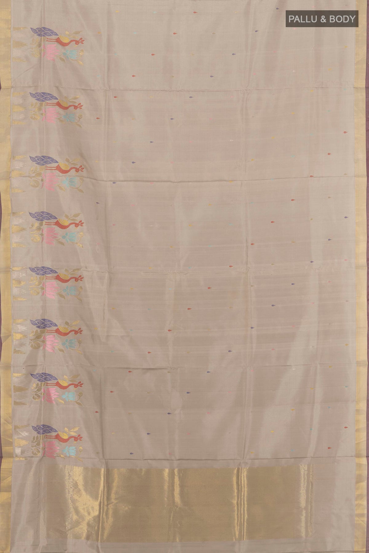 Flat view of Pure Silk Grey Uppada Saree with Zari Butta on the body and Zari Border. 