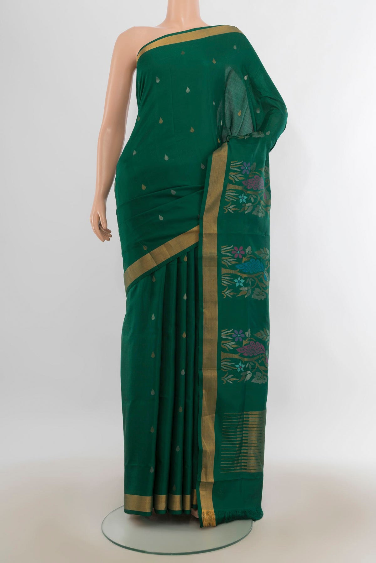 Pure Silk Green Uppada Saree with Zari Butta on the body and Zari Border.  displayed on a mannequin