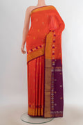 Pure Silk Brick Orange Uppada Saree with Zari Butta on the body and Zari Border.  displayed on a mannequin