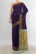 Pure Silk Navy Blue Uppada Saree with Zari Butta on the body and Fancy Border.  displayed on a mannequin