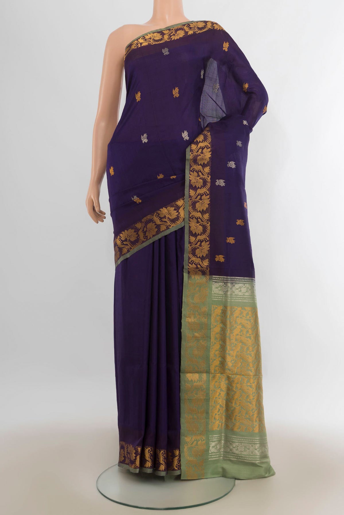 Pure Silk Navy Blue Uppada Saree with Zari Butta on the body and Fancy Border.  displayed on a mannequin