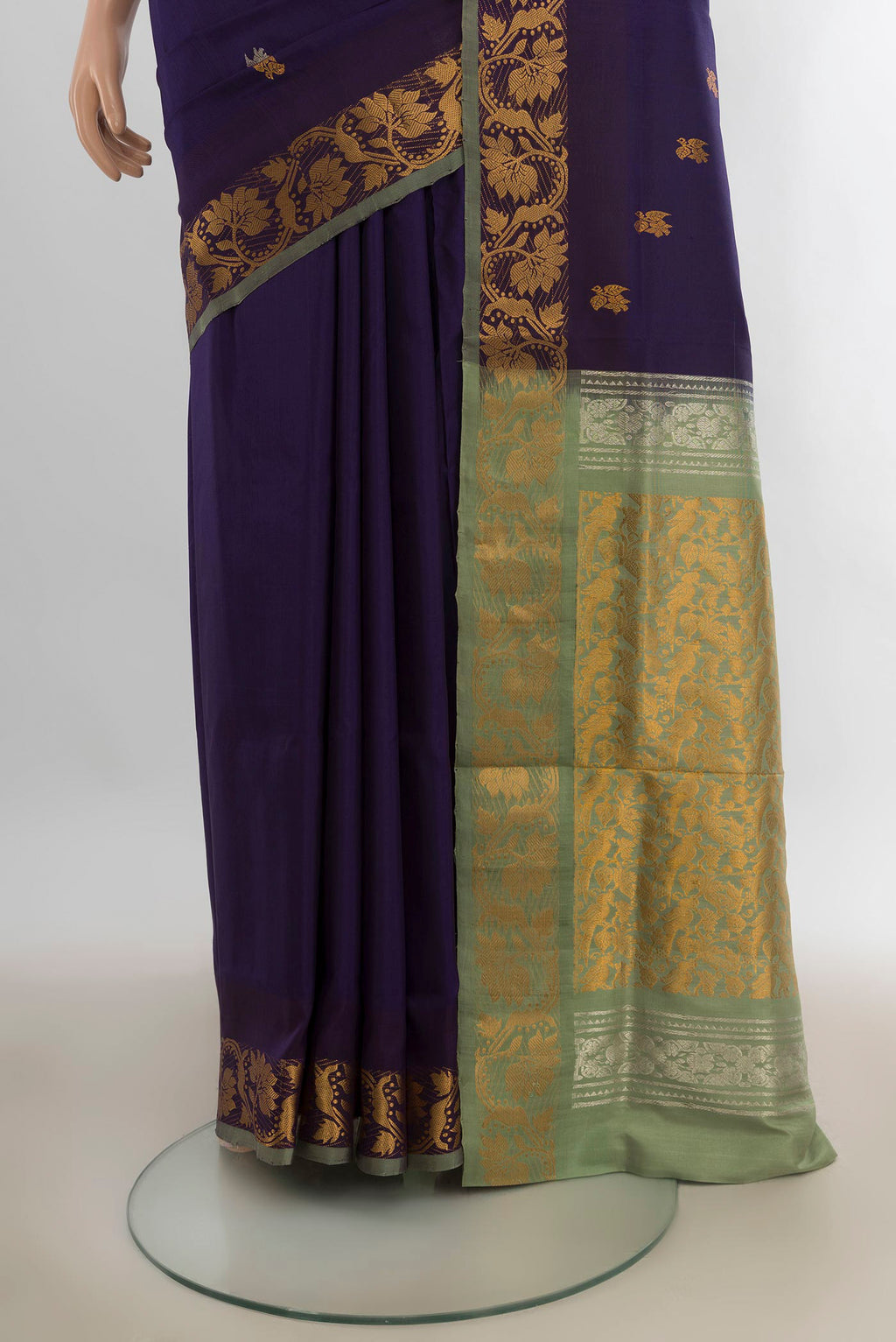Pleats and pallu of Pure Silk Navy Blue Uppada Saree with Zari Butta on the body and Fancy Border. 