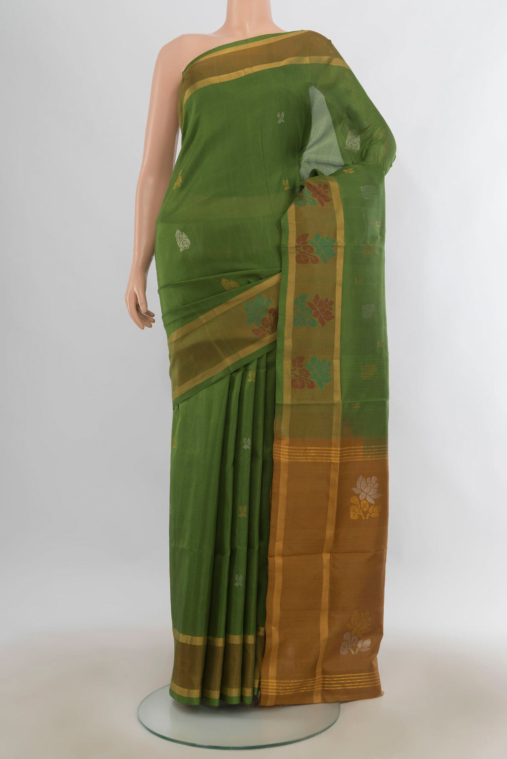 Pure Silk Green Uppada Saree with Zari Butta on the body and Zari Border.  displayed on a mannequin