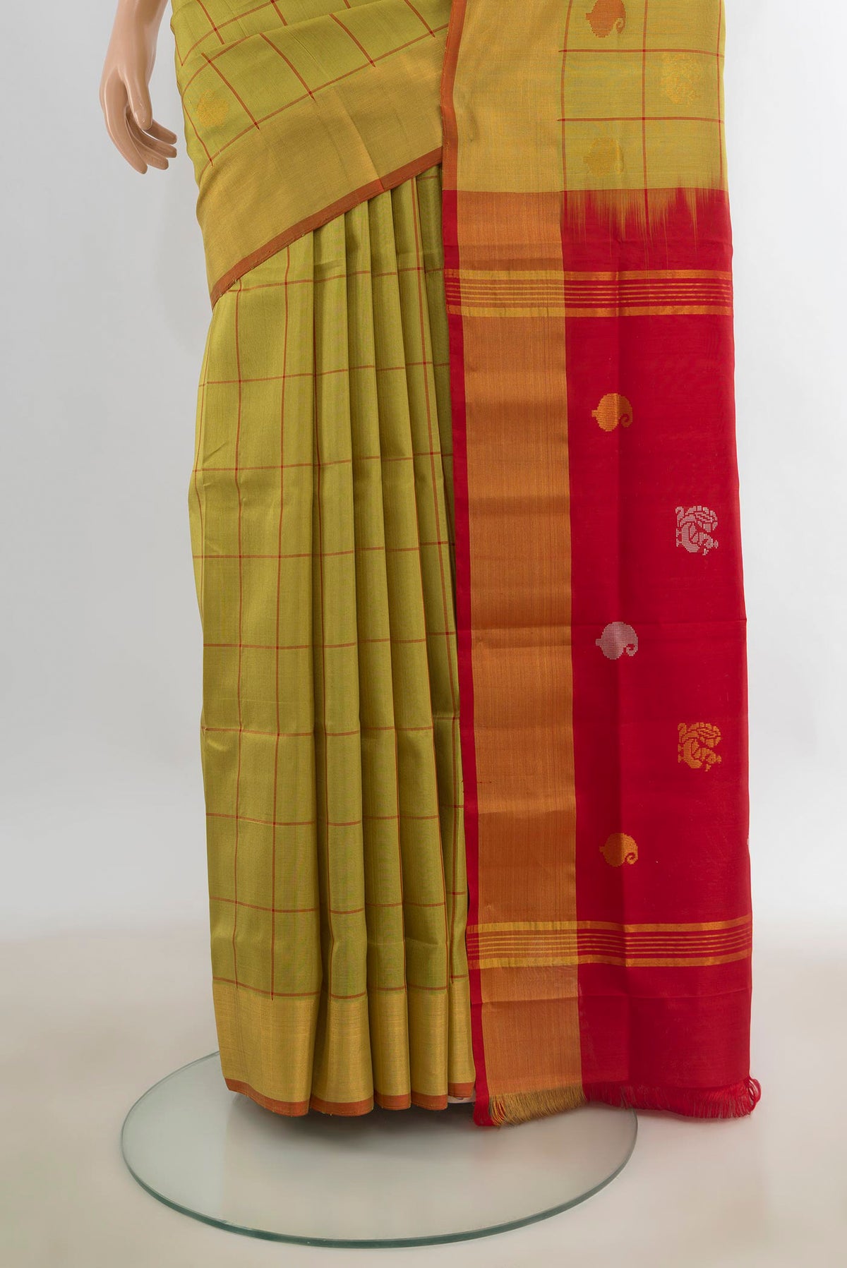 Pleats and pallu of Pure Silk Yellow Uppada Saree with Checked design on the body and Zari Border. 