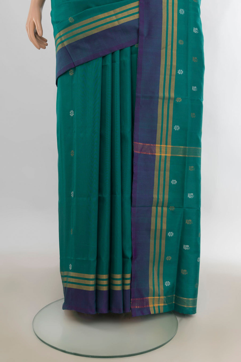 Pleats and pallu of Pure Silk Teal Uppada Saree with Zari Butta on the body and Plain Border. 
