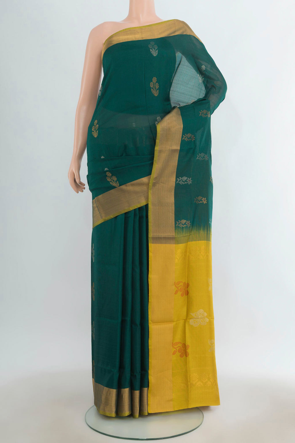 Pure Silk Green Uppada Saree with Zari Butta on the body and Zari Border.  displayed on a mannequin