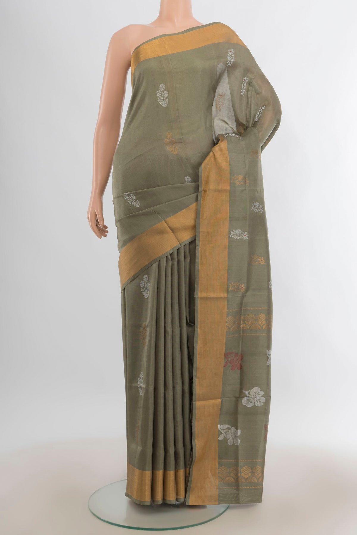 Pure Silk Light Green Uppada Saree with Zari Butta on the body and Zari Border.  displayed on a mannequin