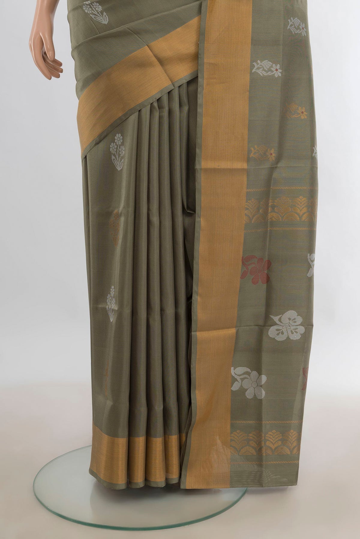 Pleats and pallu of Pure Silk Light Green Uppada Saree with Zari Butta on the body and Zari Border. 