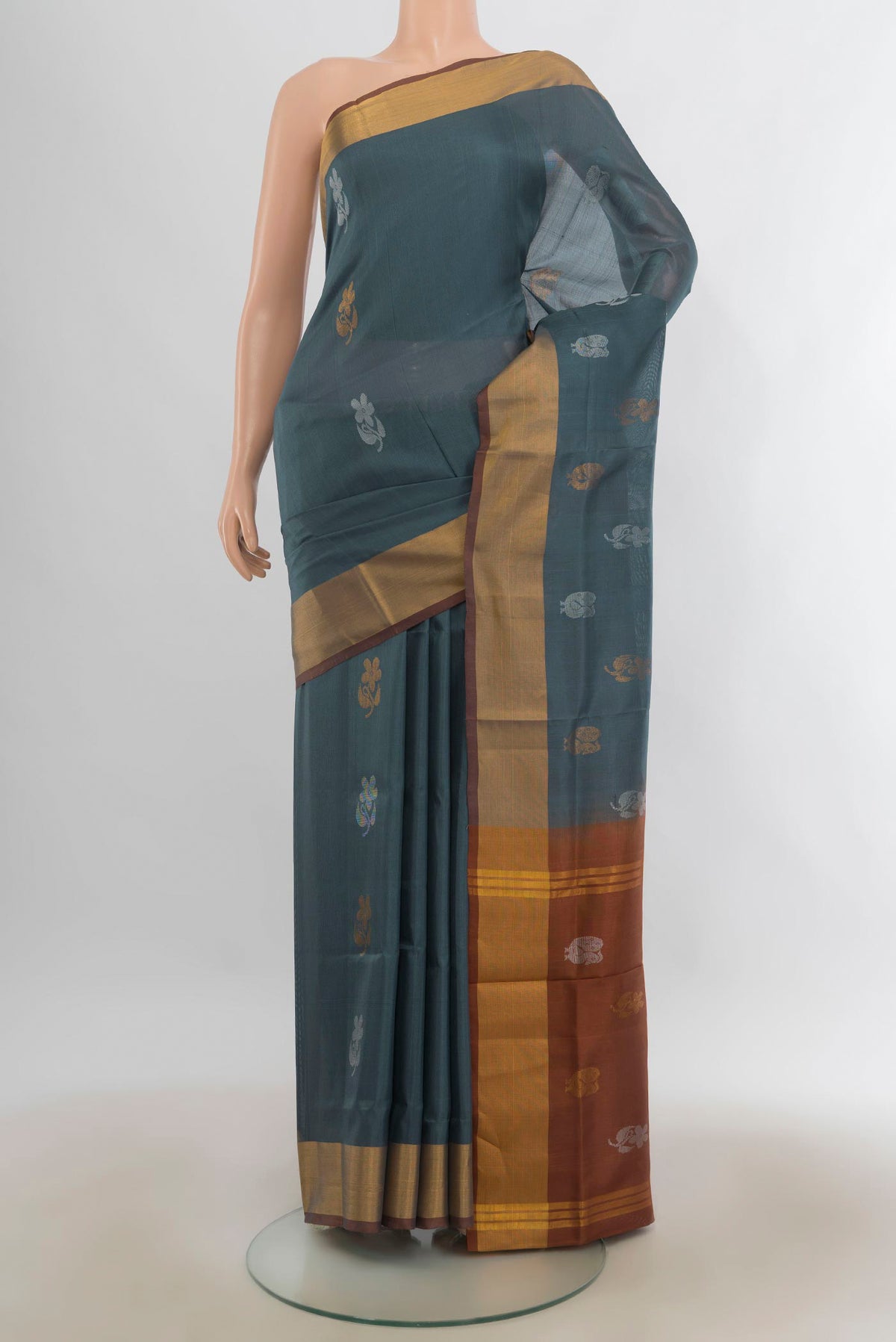 Pure Silk Davys Grey Uppada Saree with Zari Butta on the body and Zari Border.  displayed on a mannequin