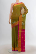 Pure Silk Mehandi Green Uppada Saree with Zari Butta on the body and Zari Border.  displayed on a mannequin