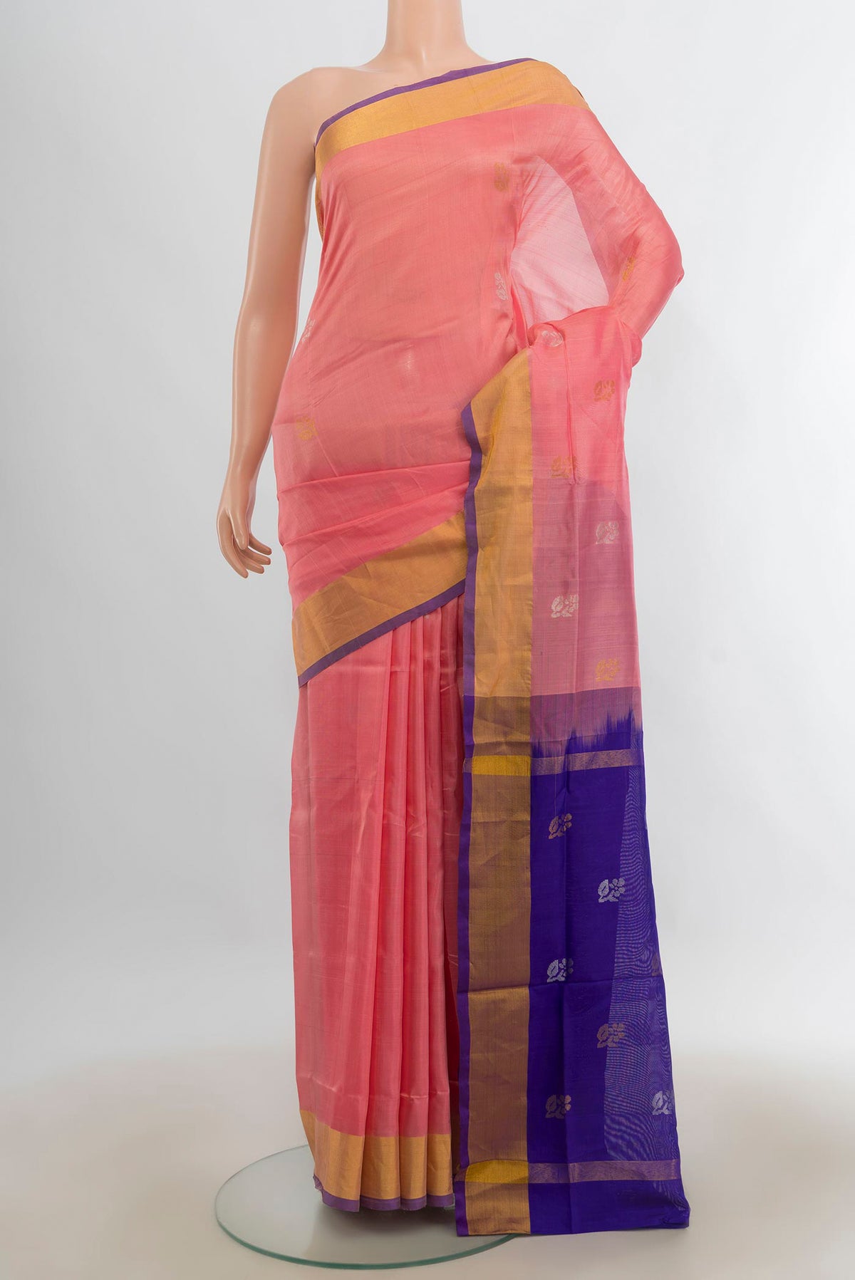 Pure Silk Rose Gold Uppada Saree with Zari Butta on the body and Silk Border.  displayed on a mannequin