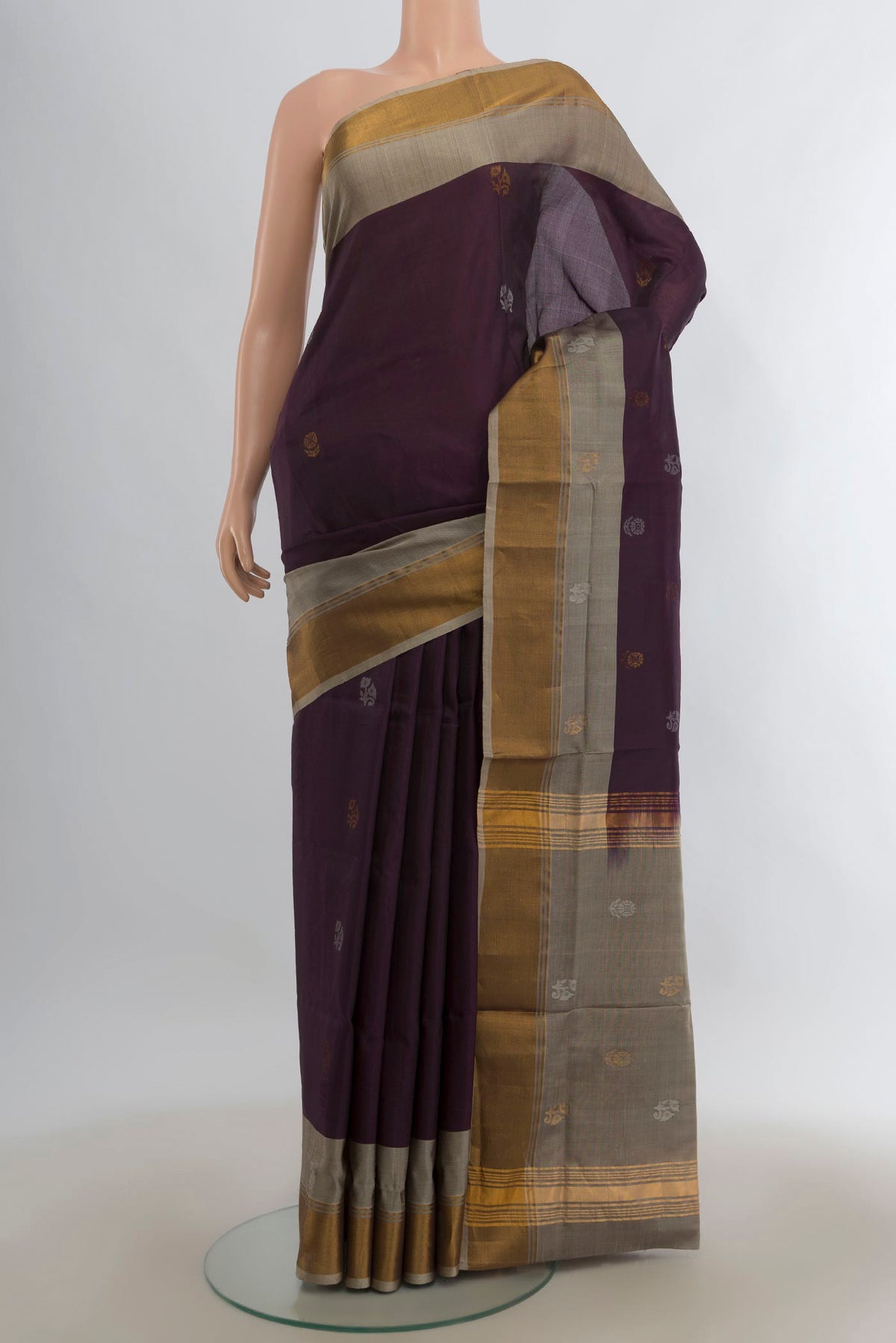 Pure Silk Coffee Brown Uppada Saree with Zari Butta on the body and Zari Border.  displayed on a mannequin