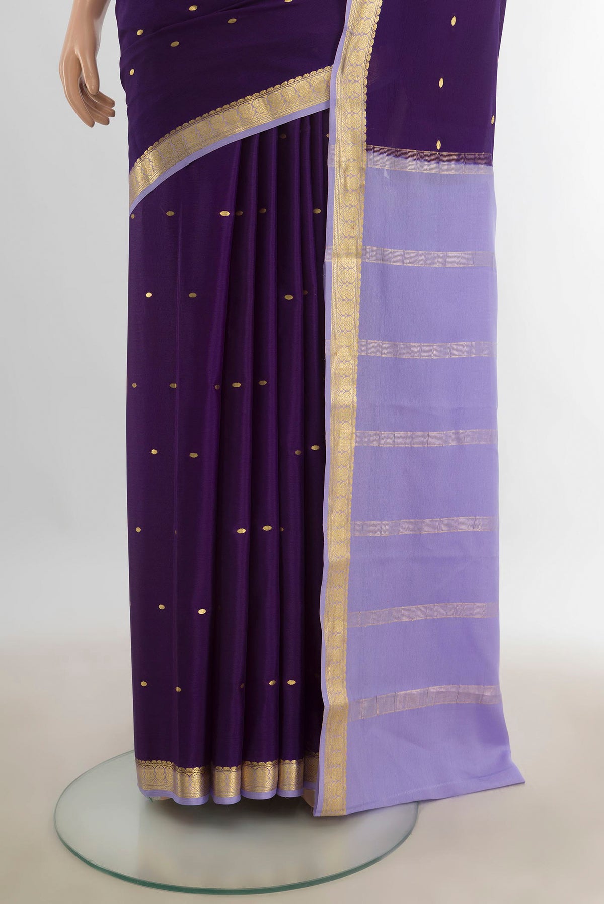Pleats and pallu of Violet Mysore Crepe Saree with Zari Butta on the body and Silk Border. 