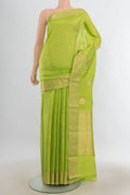 Pure Silk Light Green Banarasi Katan Saree with Zari Butta on the body and Zari Border.  displayed on a mannequin