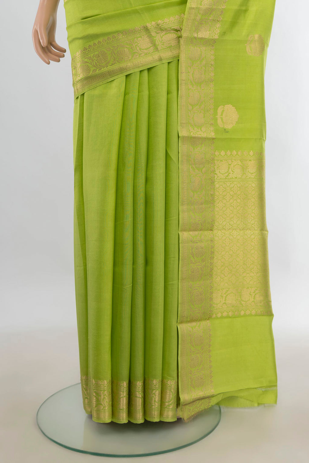Pleats and pallu of Pure Silk Light Green Banarasi Katan Saree with Zari Butta on the body and Zari Border. 