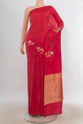 Pure Silk Red Banarasi Katan Saree with Zari Butta on the body and Without Border.  displayed on a mannequin