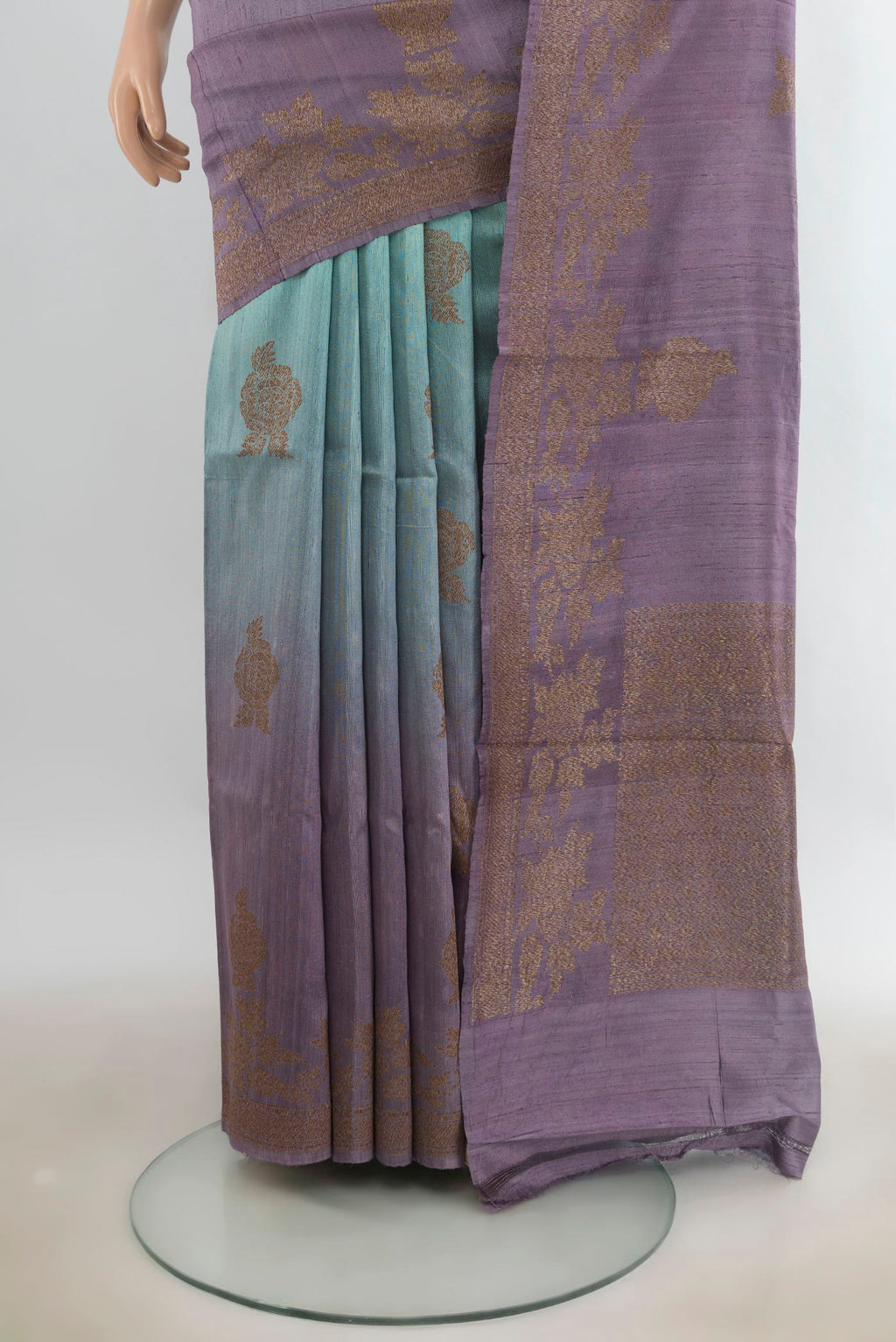 Pleats and pallu of Multi Color Tussar Saree with Zari Butta on the body and Zari Border. 