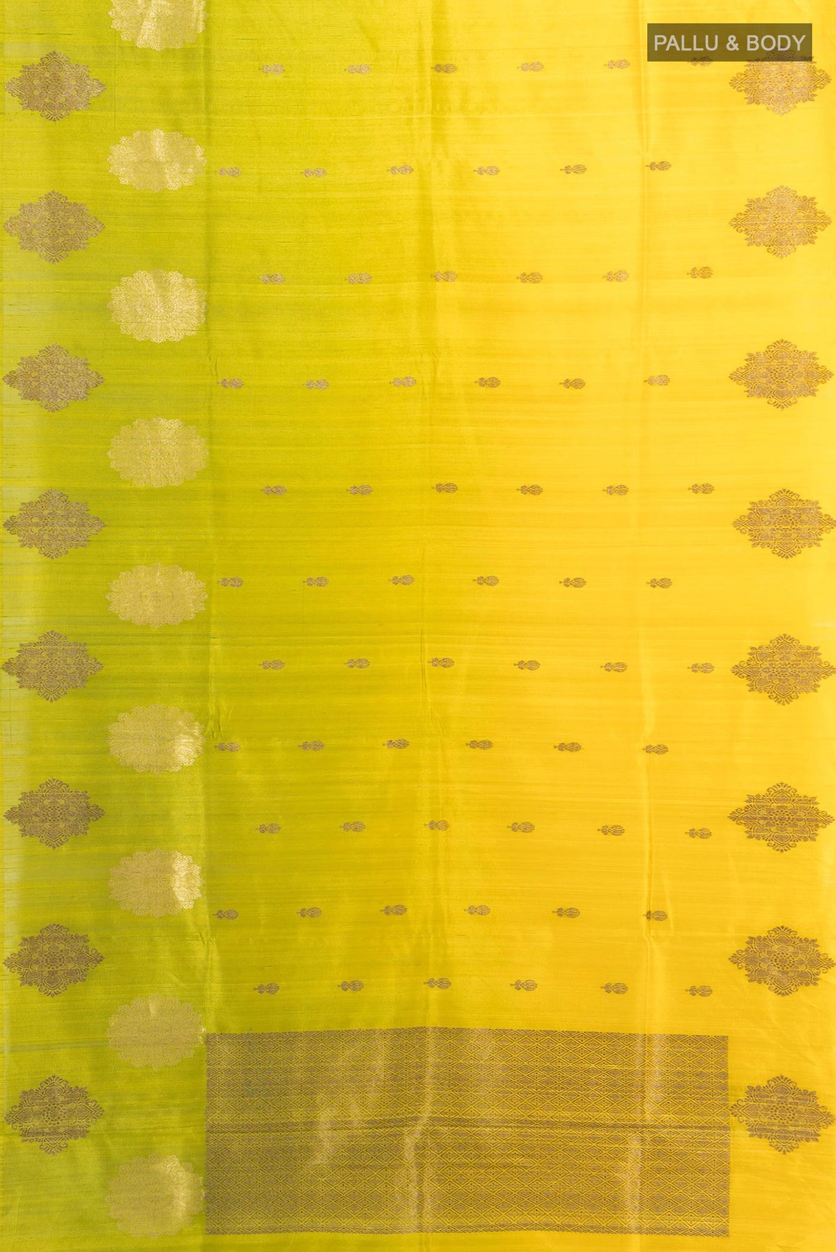 Flat view of Lemon Yellow Tussar Saree with Zari Butta on the body and Zari Border. 