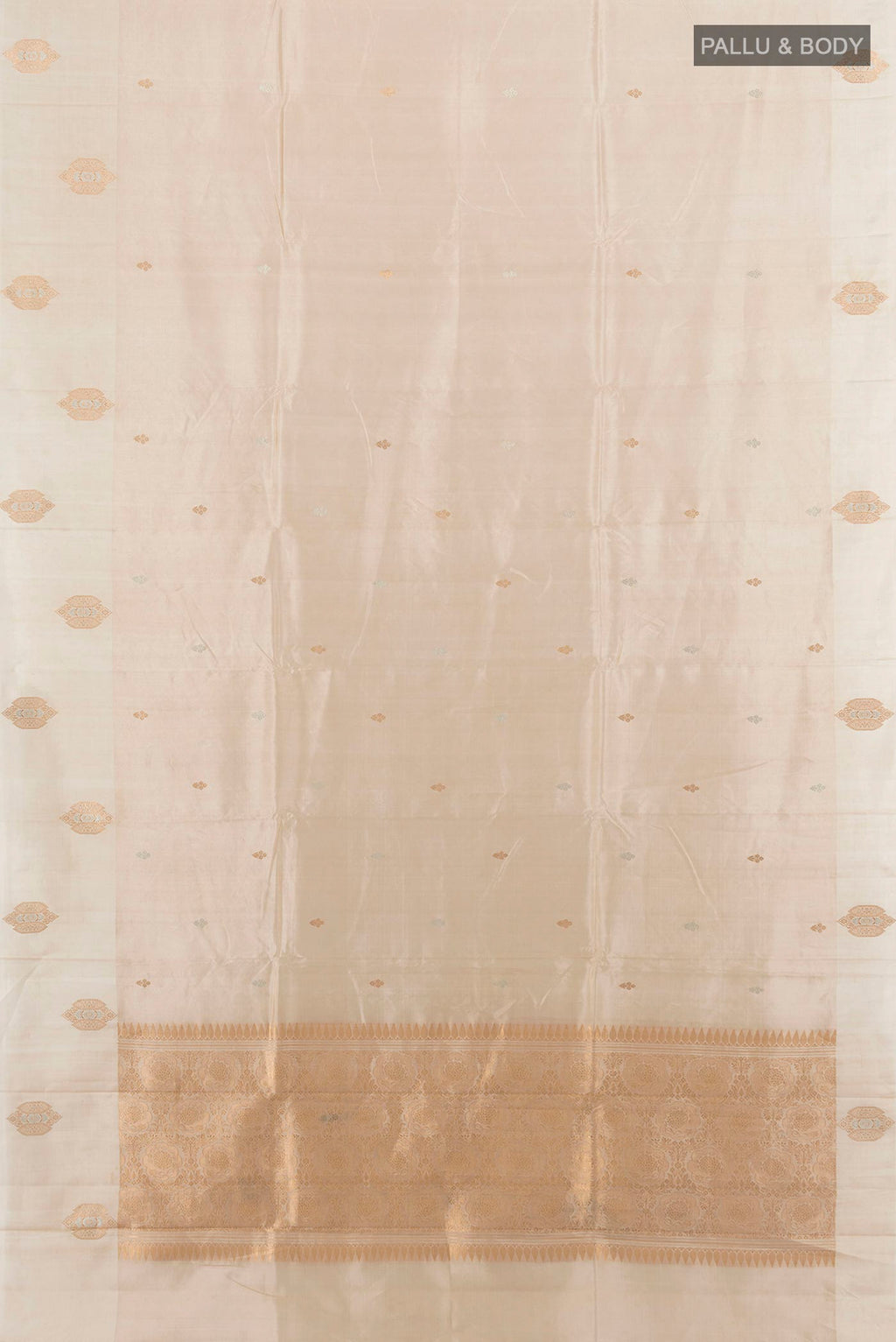 Flat view of Pure Silk Cream Banarasi Katan Saree with Zari Butta on the body and Plain Border. 