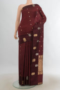 Pure Silk Coffee Brown Banarasi Katan Saree with Zari Butta on the body and Silk Border.  displayed on a mannequin