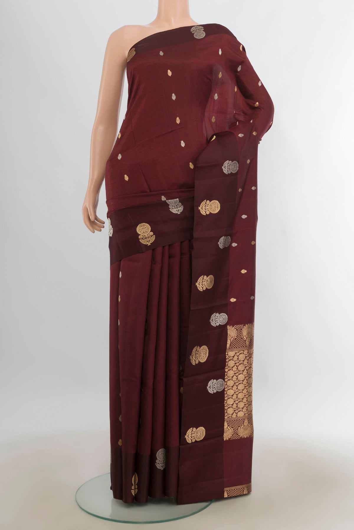 Pure Silk Coffee Brown Banarasi Katan Saree with Zari Butta on the body and Silk Border.  displayed on a mannequin