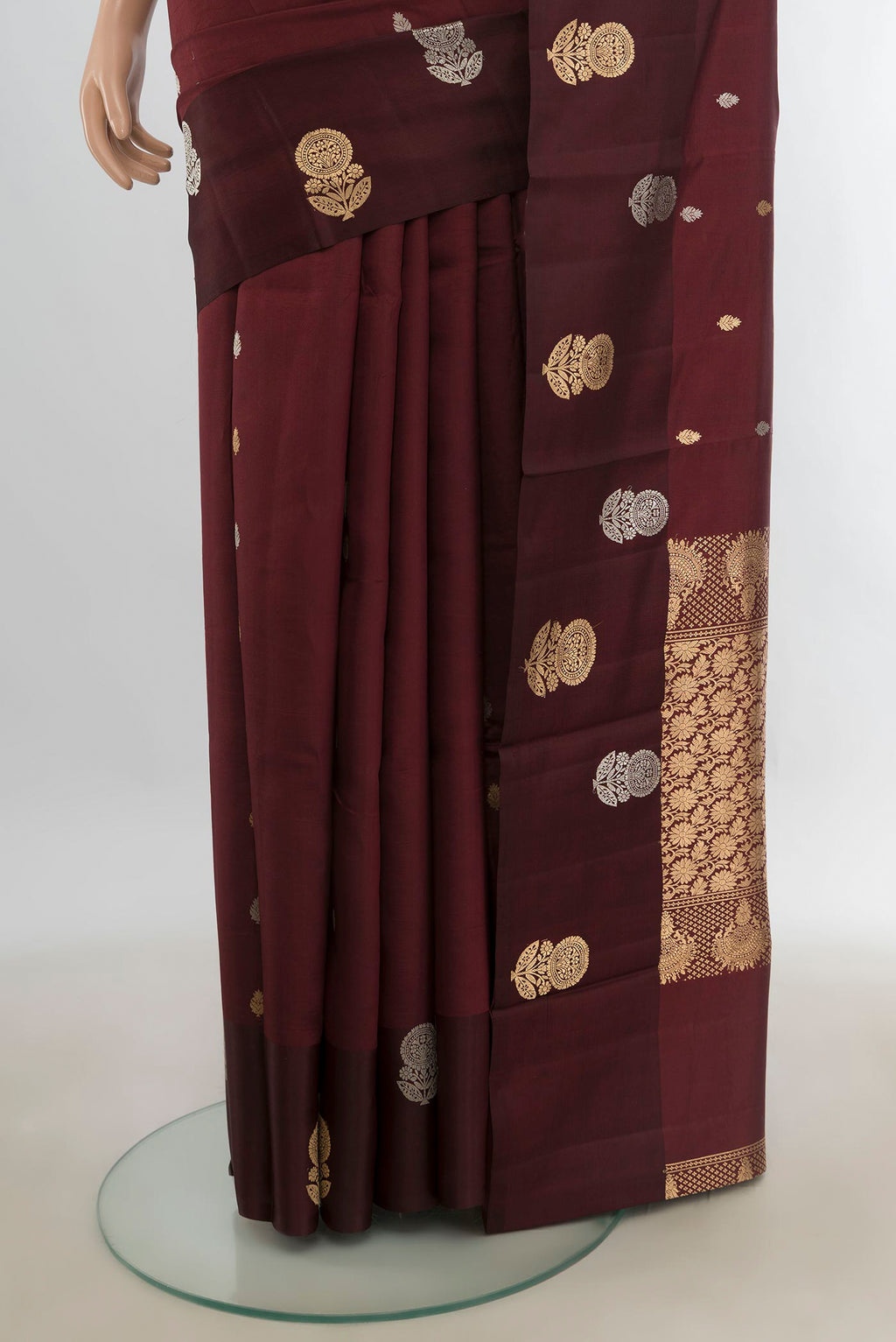 Pleats and pallu of Pure Silk Coffee Brown Banarasi Katan Saree with Zari Butta on the body and Silk Border. 