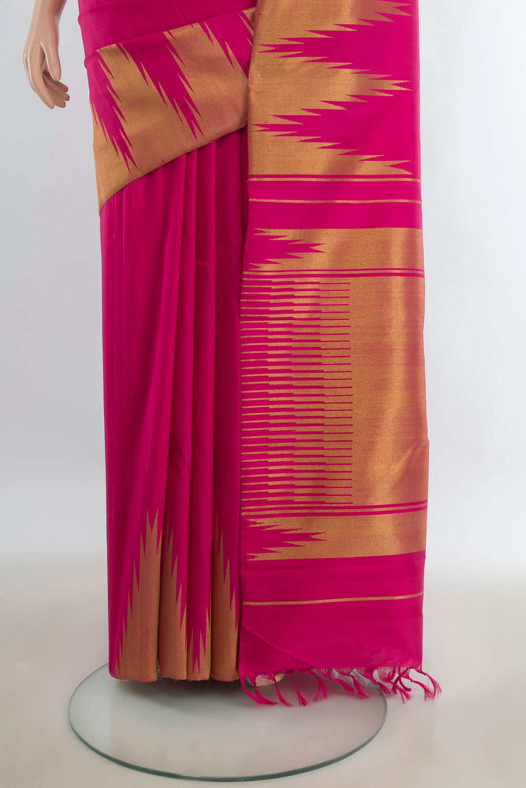 Pleats and pallu of Pure Silk Pure Zari Dark Pink Kanjivaram Saree with Zari Butta on the body and Silk Border. 