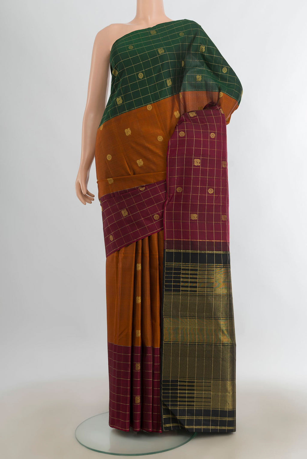 Pure Silk Multi Color Kanjivaram Saree with Zari Butta on the body and Silk Border.  displayed on a mannequin